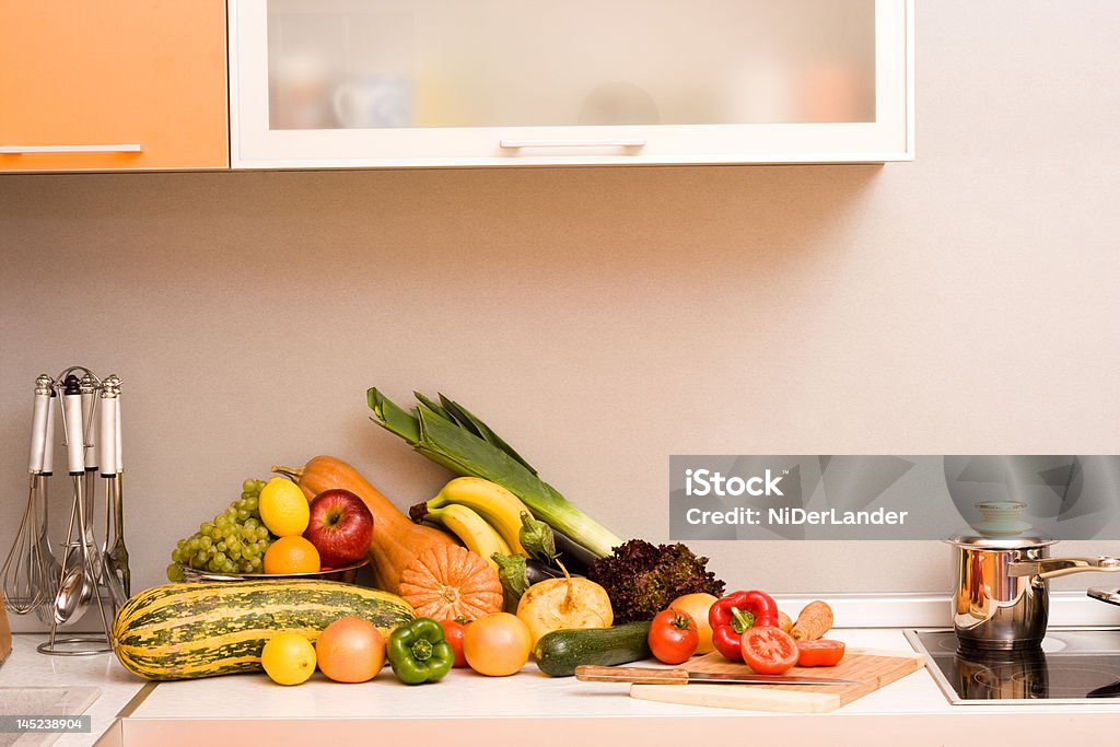 Vegetables in modern kitchen Vegetables ready to be cooked in modern kitchen Apple - Fruit Stock Photo