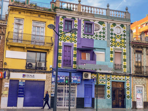 Valencia, Spain - December 18, 2022: View of old fashioned building facade. The use of tiles to decorate houses fronts is a widespread tradition along the whole Valencian Community