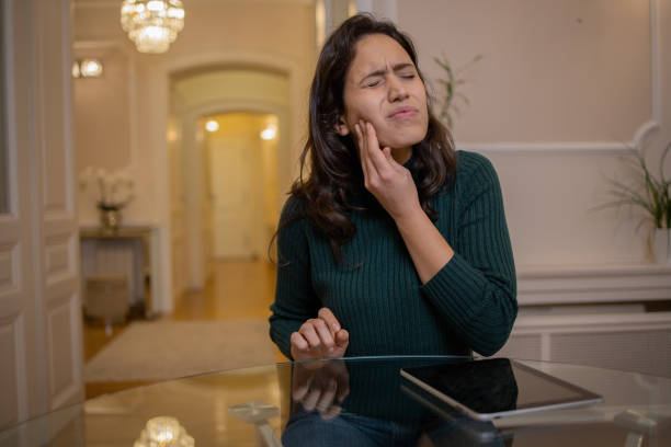 istock Young woman suffering from pain 1452394663