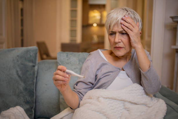istock Senior woman having a flu 1452397925
