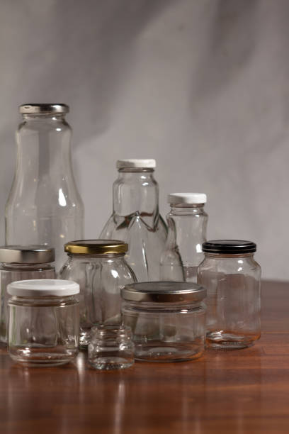 istock reusable glass containers for reuse on a dark wooden table with a white background 1452409720