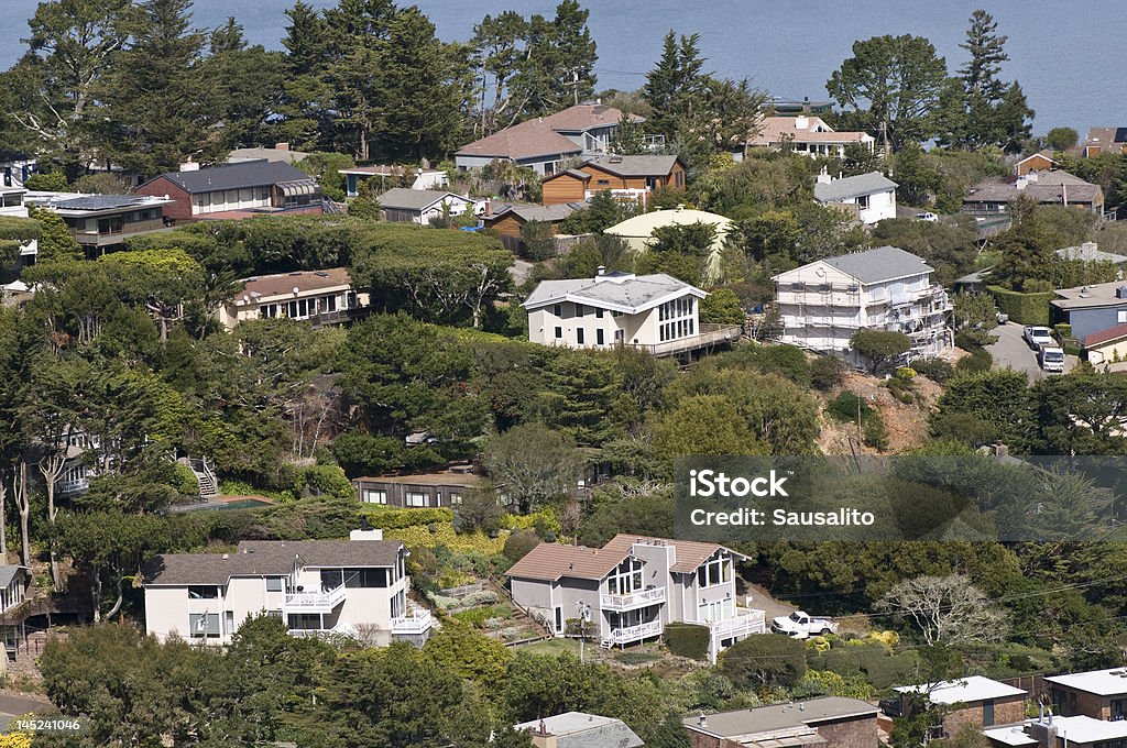 California hillside homes The crest of a hill in Sausalito, California showing the modern homes that overlook the San Francisco Bay. California Stock Photo