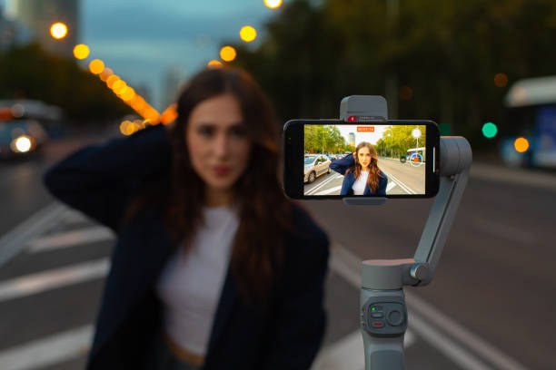 istock Woman taking selfie on road 1452410722
