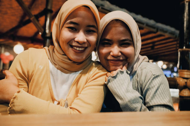istock two woman  enjoying dinner in restaurant 1452415393
