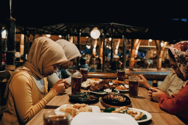 istock Family enjoying dinner in restaurant 1452415502