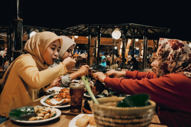 istock Family enjoying dinner in restaurant 1452415523