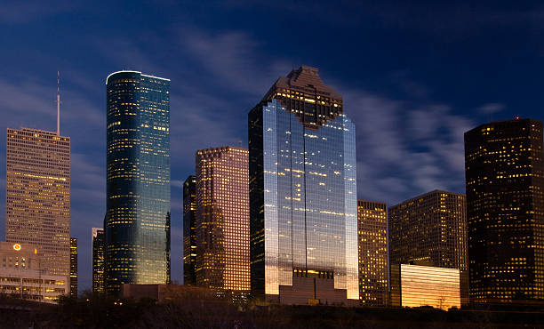 City skyline at night fall stock photo