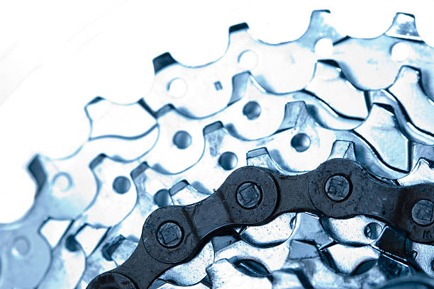 Dark chain on blue gears stock photo