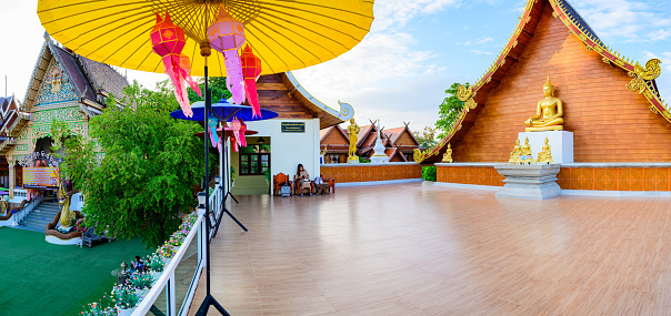 NAN, THAILAND - November 4, 2020 : Panorama View of Beautiful Building and Rice Fied at Si Mongkol Temple, Nan Province.