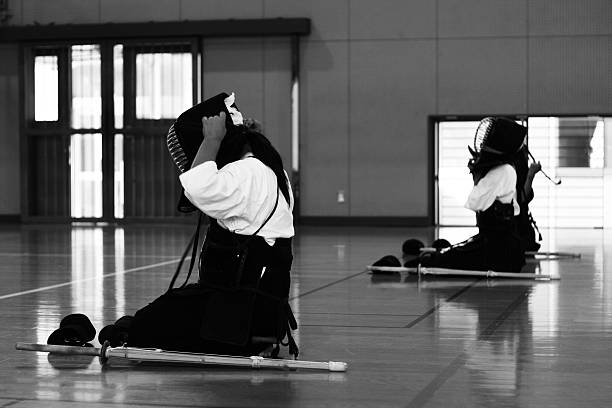 Japanese Kendo students Japanese students practice Kendo at a Junior High School kendo stock pictures, royalty-free photos & images