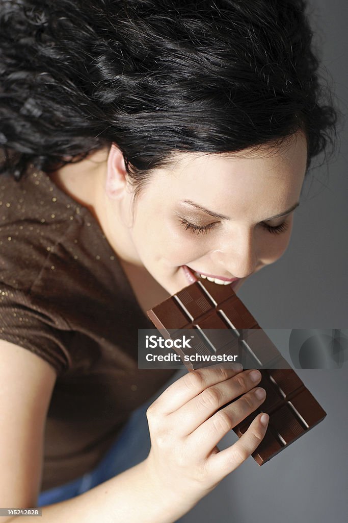 Comer o chocolate - Royalty-free 20-29 Anos Foto de stock