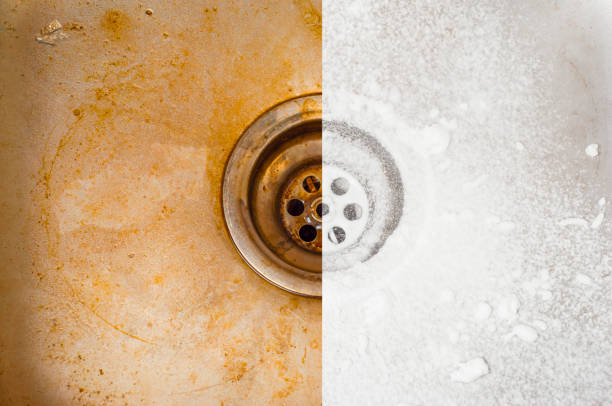 istock Kitchen sink before and after applying the foamy detergent 1452430494