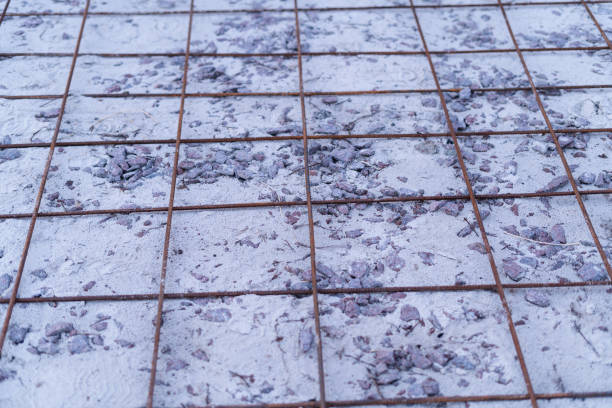 istock Iron reinforcement lying on the floor prepared for bonding and reinforcement before pouring concrete 1452430548