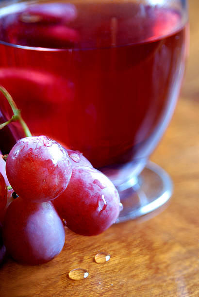 istock close-up wine carafe and some grapes 145243132