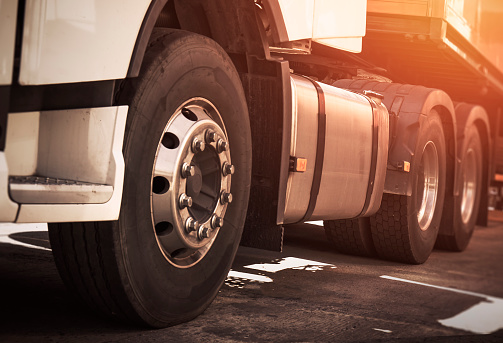 Semi Trailer Truck on Parking. Truck Wheels Tires. Rubber, Truck Tyres. Freight Trucks Transport Logistics.
