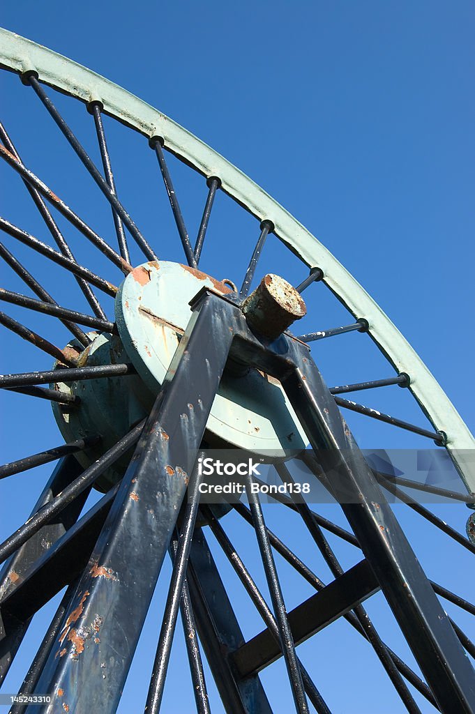 Pulley Wheel Pulley wheel from a coal mine against at blue sky Circle Stock Photo