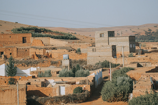 Township houses close to the sea in the sand dunes in Cape Town, South Africa