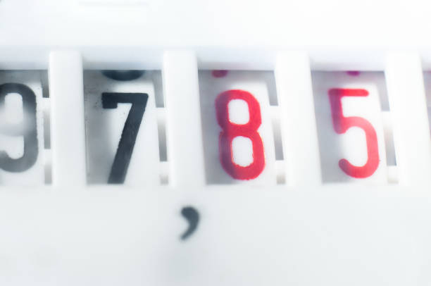 istock Water meter figures close up, macro photography 1452433242