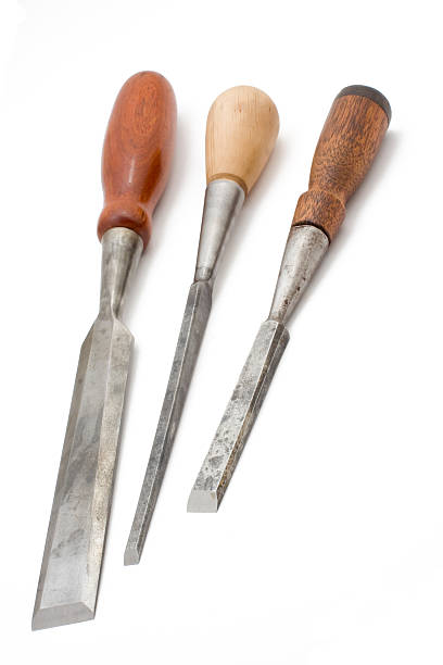 istock three vintage chisels isolated on white background. 145243359