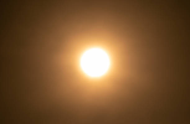 istock The sun on the yellow sky blur focus 1452435523