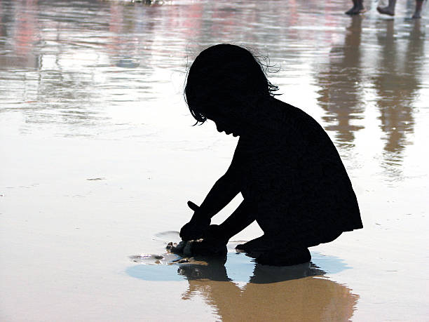 Sri Lankan young boy posing on the beach, Sri Lanka