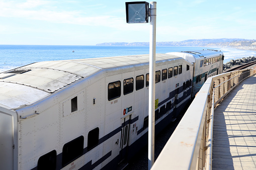 Metrolink Commuter Train running along San Clemente Beach.