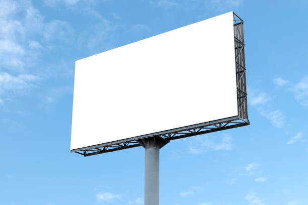 istock Outdoor billboard on blue sky background with white background mock up. clipping path 1452437108