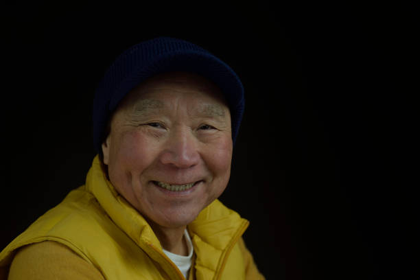 istock Smiling Japanese senior man 1452437972