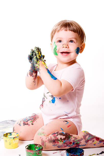 istock Girl painting with hands 145244022