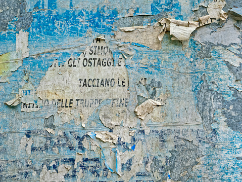 Derivative art from layers of weathered posters along the streets of Rome Italy