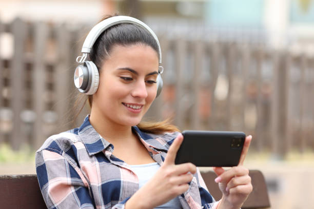 istock Teen watching media on phone 1452445097
