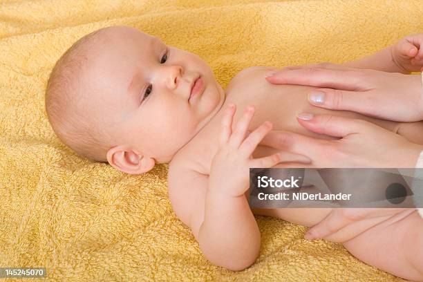 Massaging Baby Stock Photo - Download Image Now - Baby - Human Age, Massaging, Towel