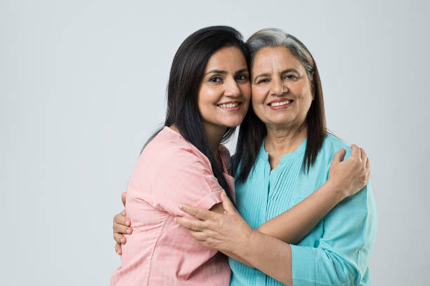 istock Happy mother and daughter embracing each other 1452451757