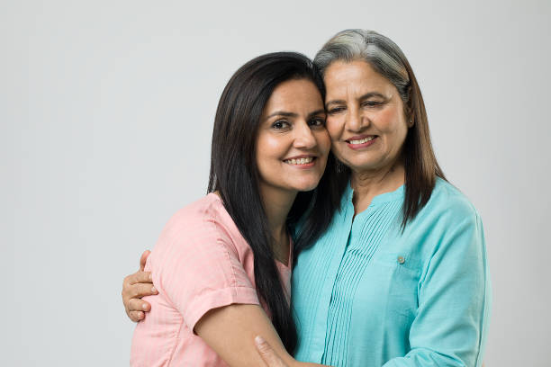 istock Happy mother and daughter embracing each other 1452451776