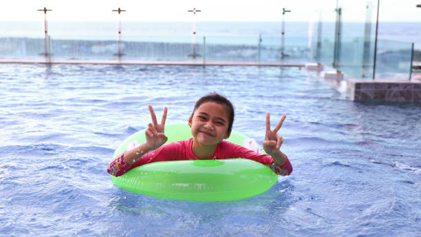 Free Stock Photo of Boy floating in pool with swim ring | Download Free ...