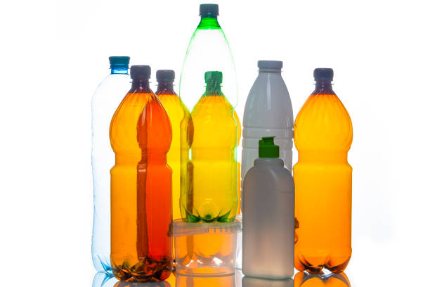 istock Eco Recycling Concepts. Various Empty Colorful Plastic Recycle Garbage Bottles and Cans In Line Together Over White 1452455396