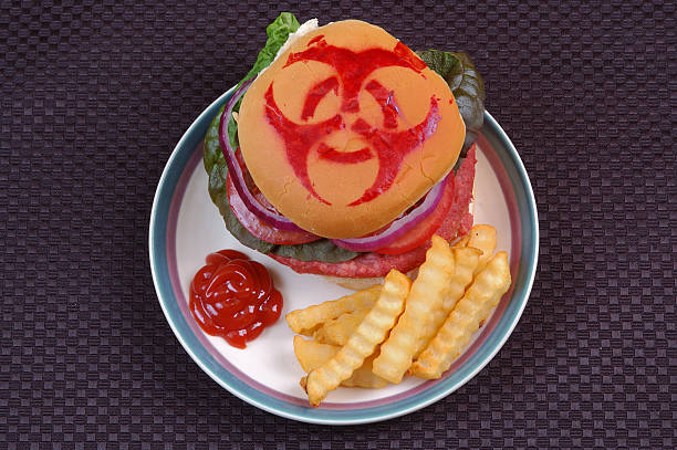 Cтоковое фото Знак биологической опасности на гамбургер булочка
