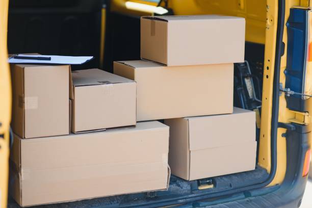 istock Courier van full of parcels and boxes 1452457909