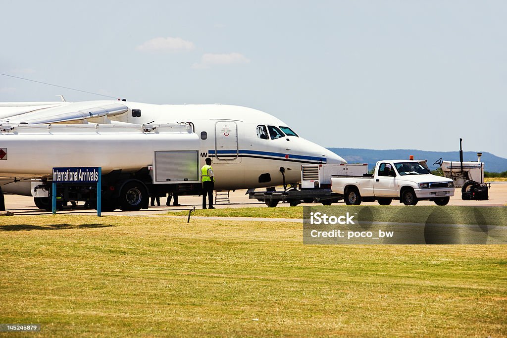 Avion Faites le plein d'énergie - Photo de Affaires libre de droits