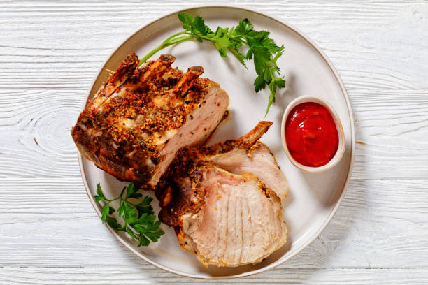 istock Standing Juicy Pork Rib Roast, top view 1452460395