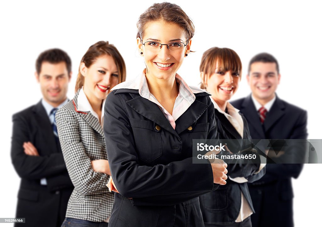 Five young professionals with a woman in front Leader and her team, Young attractive business people with focus only on businesswoman in the middle Adult Stock Photo