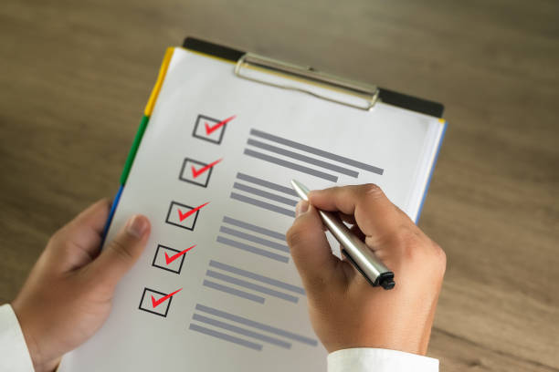 Checklist Notice Remember Planning Concept businessman writer checklist questionnaire