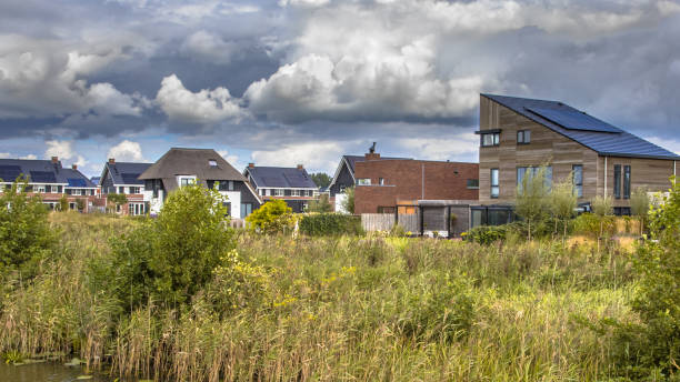 istock Neighborhood with ecological houses in natural setting 1452465405