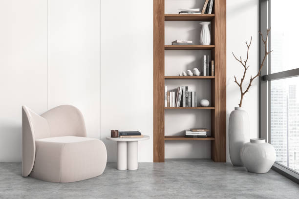 istock Front view on bright living room interior with armchair 1452465495