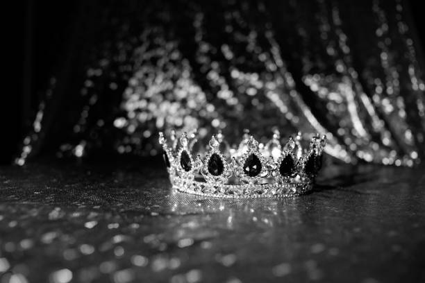 istock Golden vintage crown with blue gemstones. Sapphire. Black and white. 1452467402