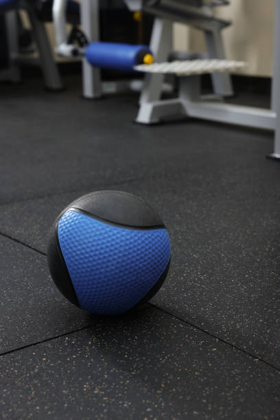 istock Blue medicine ball on floor in gym 1452468794