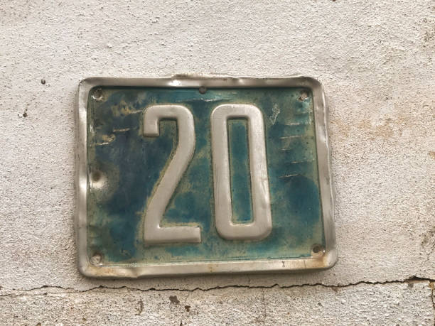 istock metal plate with the number 20 on a building facade 1452468954