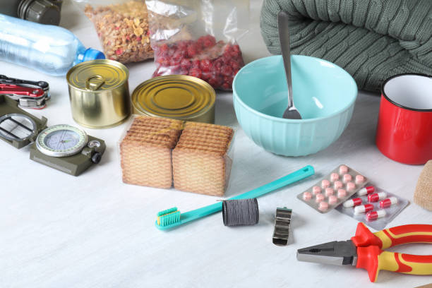 istock Disaster supply kit for earthquake on white wooden table 1452469193
