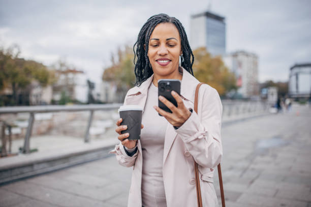 istock Modern woman in city 1452470190