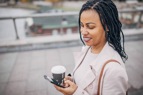 istock Modern woman in city 1452470208